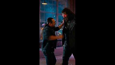 Russell Blade throws the red-eyed monster out the window and he lands on a car.