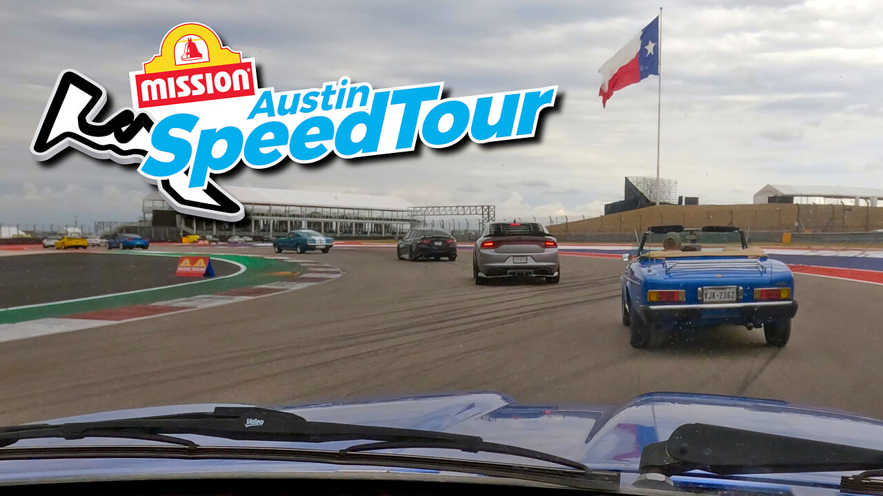 Two Old FIATs Drive Slowly Around COTA