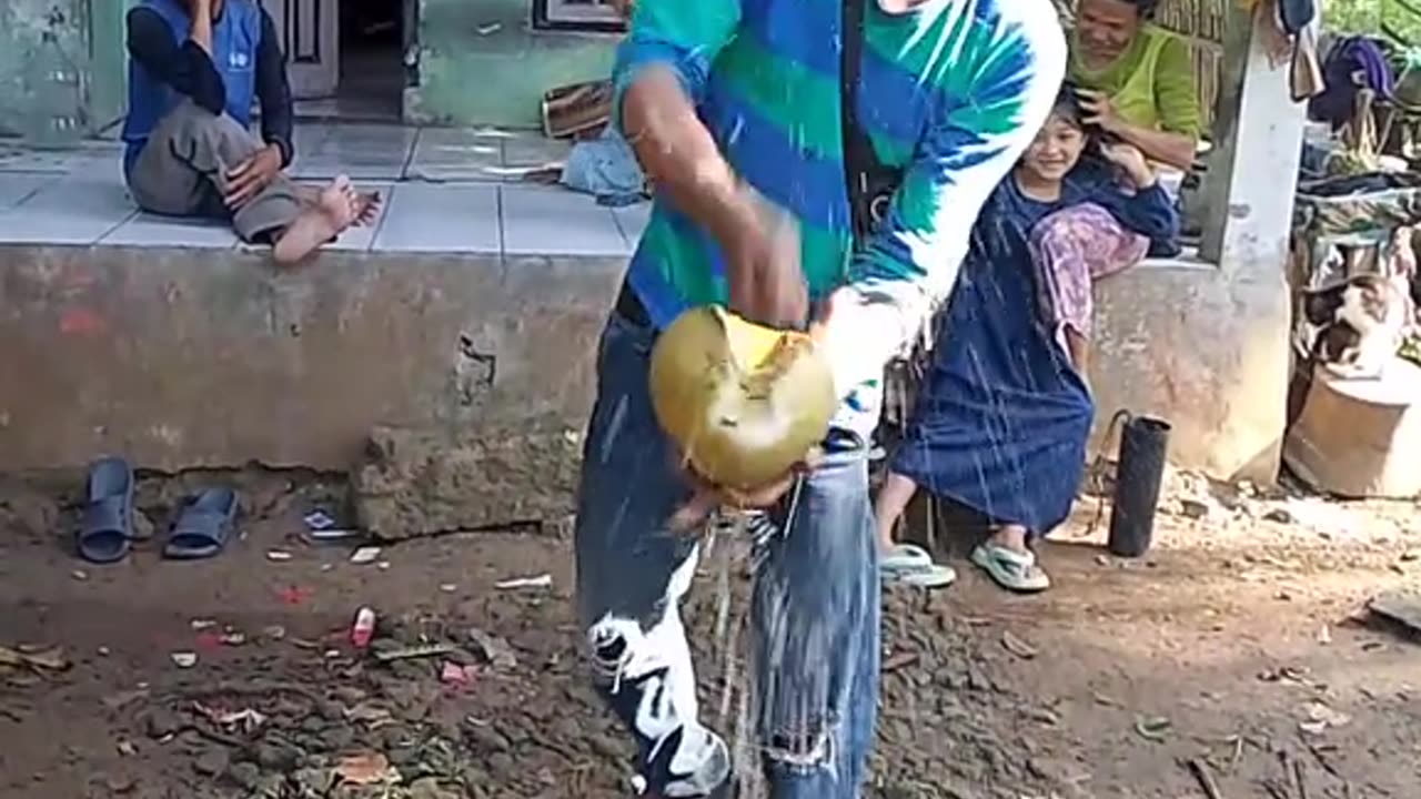 This man splits coconuts with just his hands
