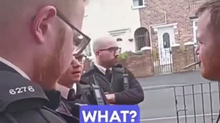 Four British officers go to a man's home to arrest him for his tweets.