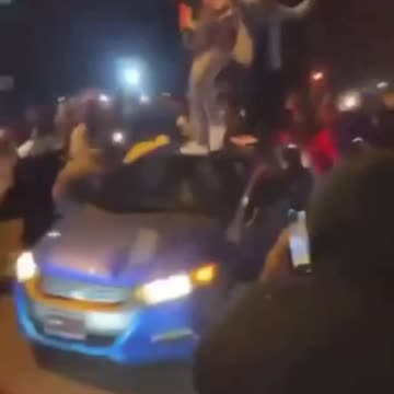 Blacks destroy stolen car