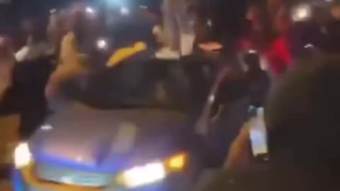 Blacks destroy stolen car