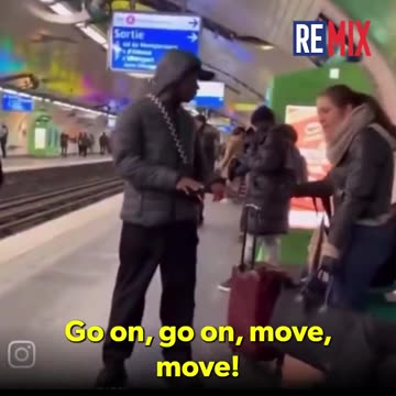 Woman berates migrant at subway station in France