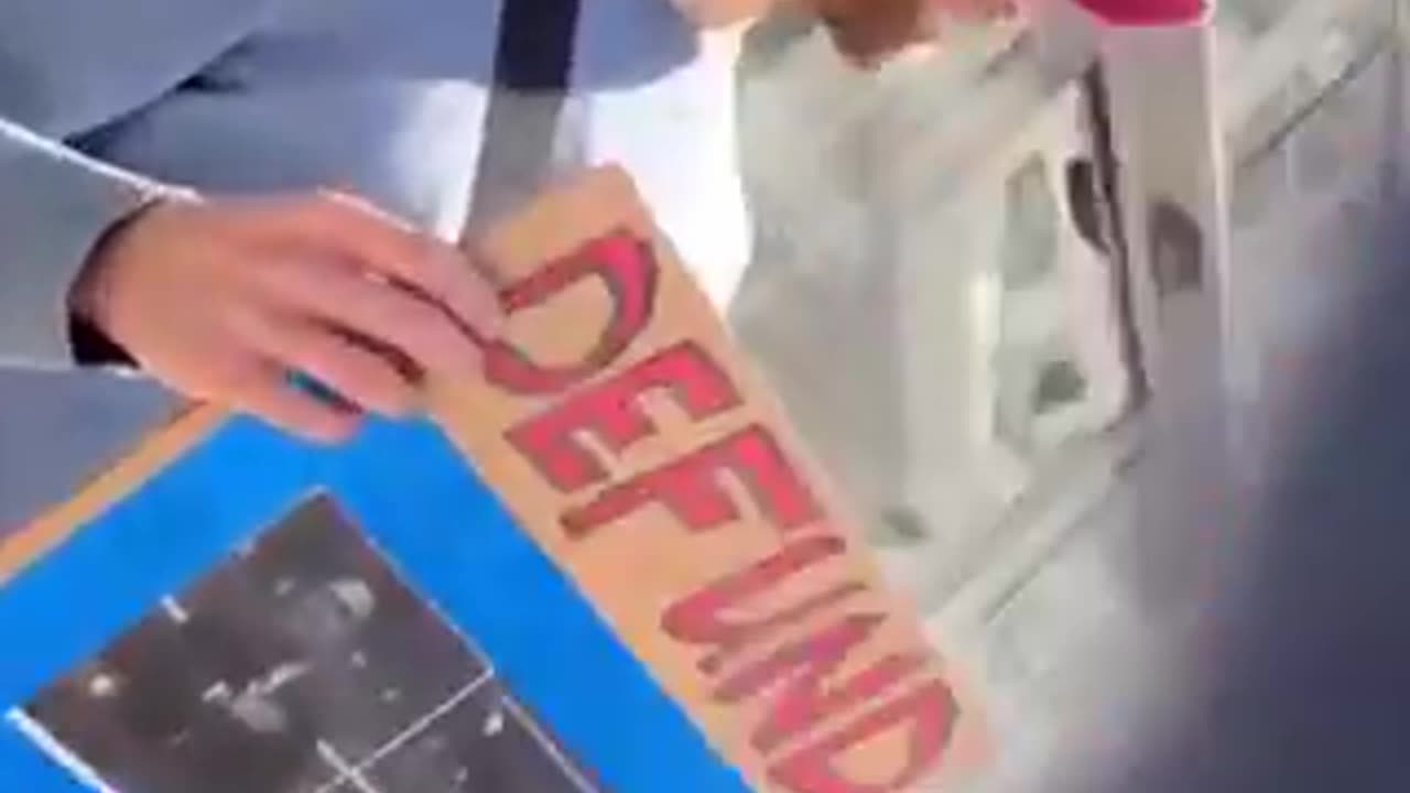 Anti-Elon protester admits he gets paid to protest outside a Tesla location.