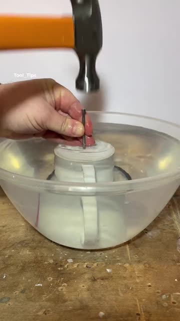 Hammering a Hole in a Ceramic Mug Underwater Life Hack