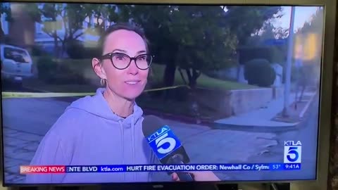 California fire looters. Why is this lady smiling? She has no idea what could happen