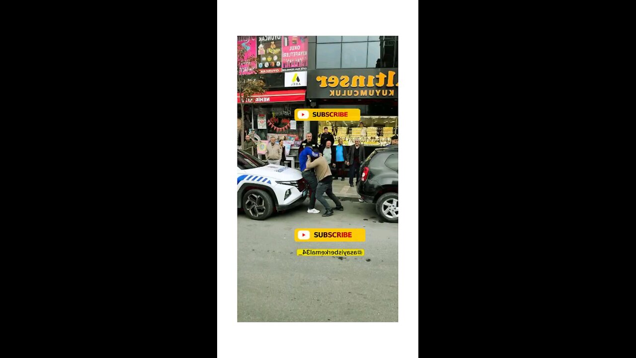 "Street Showdown: Two Motorists Fight in Traffic!