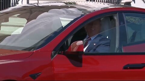 Trump Checks Out A Tesla At The White House