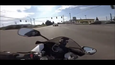 Helmet cam accident of motorcyclist excessively speeding and crashing