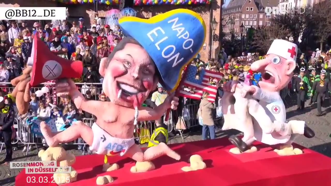 Elon Musk was shown today with a swastika in his hand at the carnival in Düsseldorf, Germany.