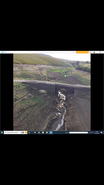 Yorkshire reservoir in drought. Old bridge fully visible (Part 2 of 2)