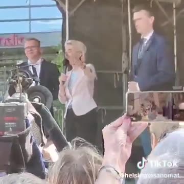 At that very moment a man was arrested for protesting