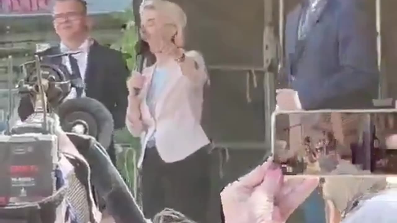 At that very moment a man was arrested for protesting