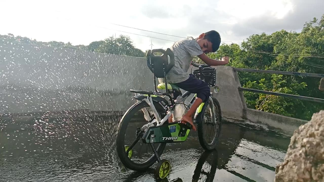 rainwater fun with bycycle