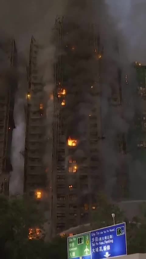 At least 36 people killed, 279 missing after fire rips through apartment buildings in Hong Kong