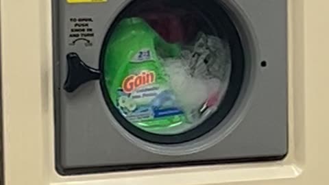 Detergent Bottle Washed At Laundromat