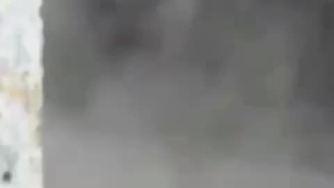 Israeli warplanes bomb a home in the Buraij refugee camp, central Gaza