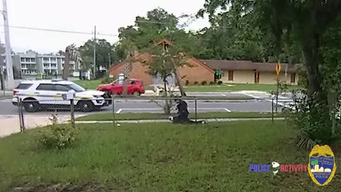 Robber pulls gun and shoots cop during struggle on the ground