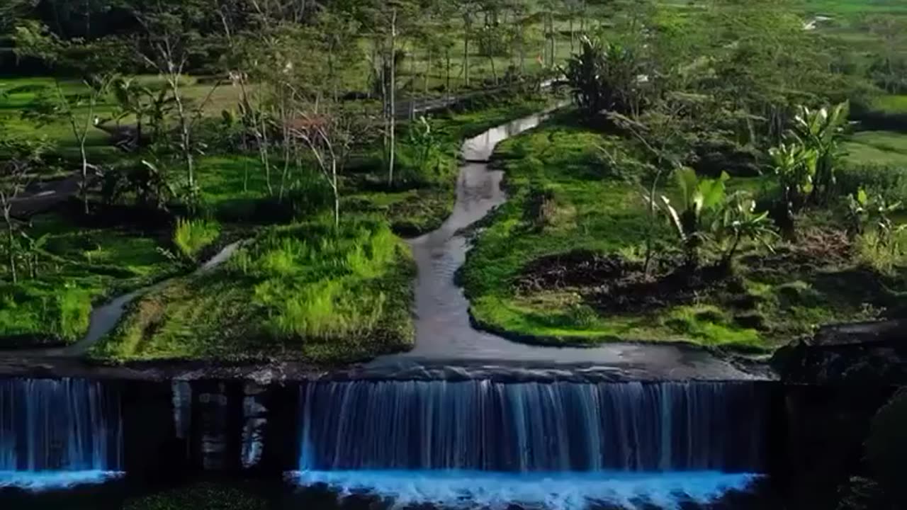 Grojogan Watu Purbo is a spectacular waterfall on the island of Java in the Sleman , Indonesia