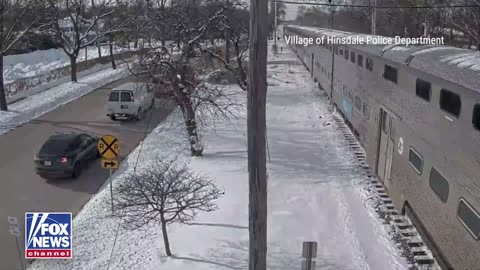 An 80-year-old woman avoided serious injury after her SUV got stuck on railroad