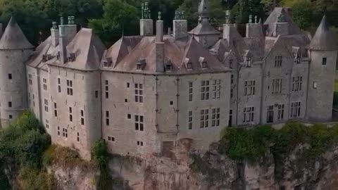 Valzin Castle is located on the steep, rocky bank of the Meuse River in Wallonia
