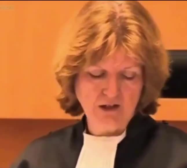 The father enraged throws a chair at the judge