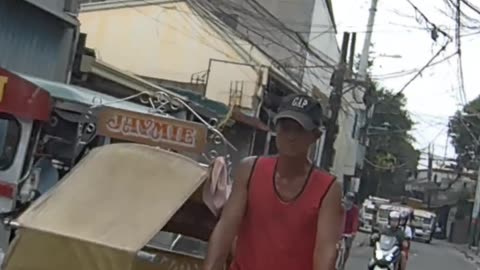 Jeepneys and Padyaks Along Gov. A. Pascual Street in Navotas City in the Philippines