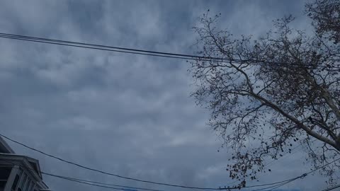 "Clouds" in the atmosphere blocking direct light from the white sun(blue hue) and the yellow sun