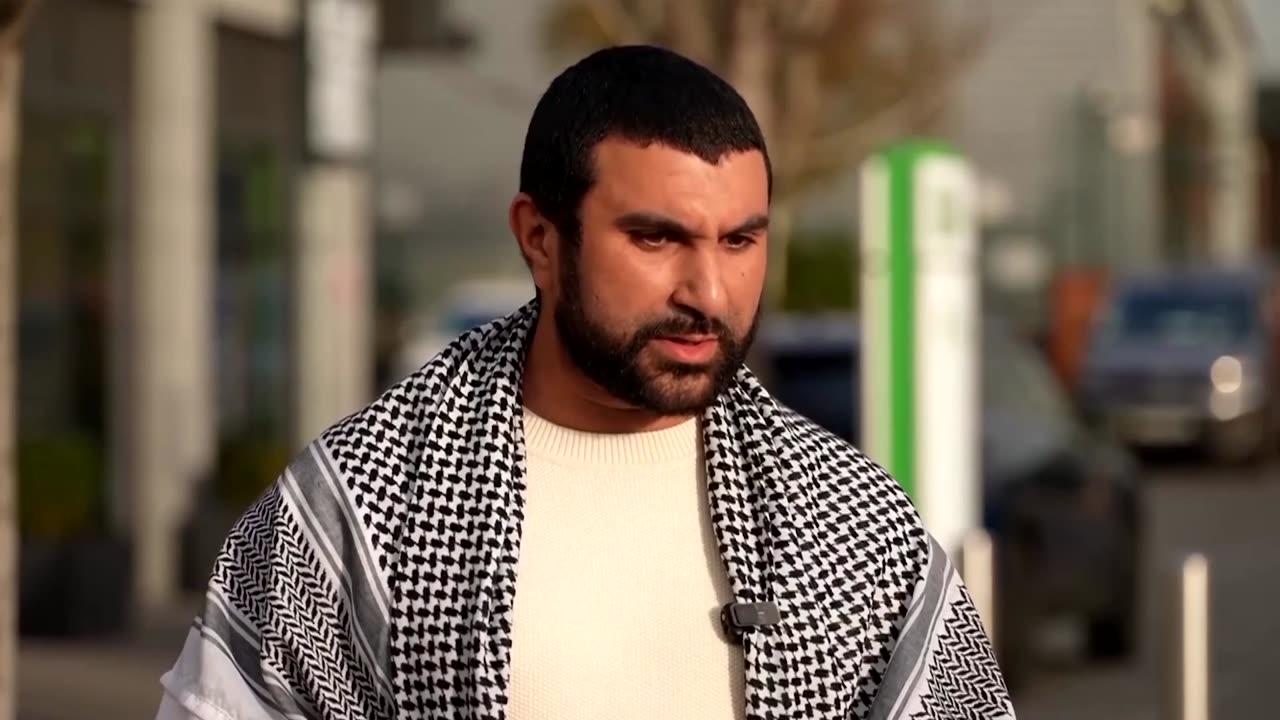 UK commentator Sami Hamdi arrives home after US detention