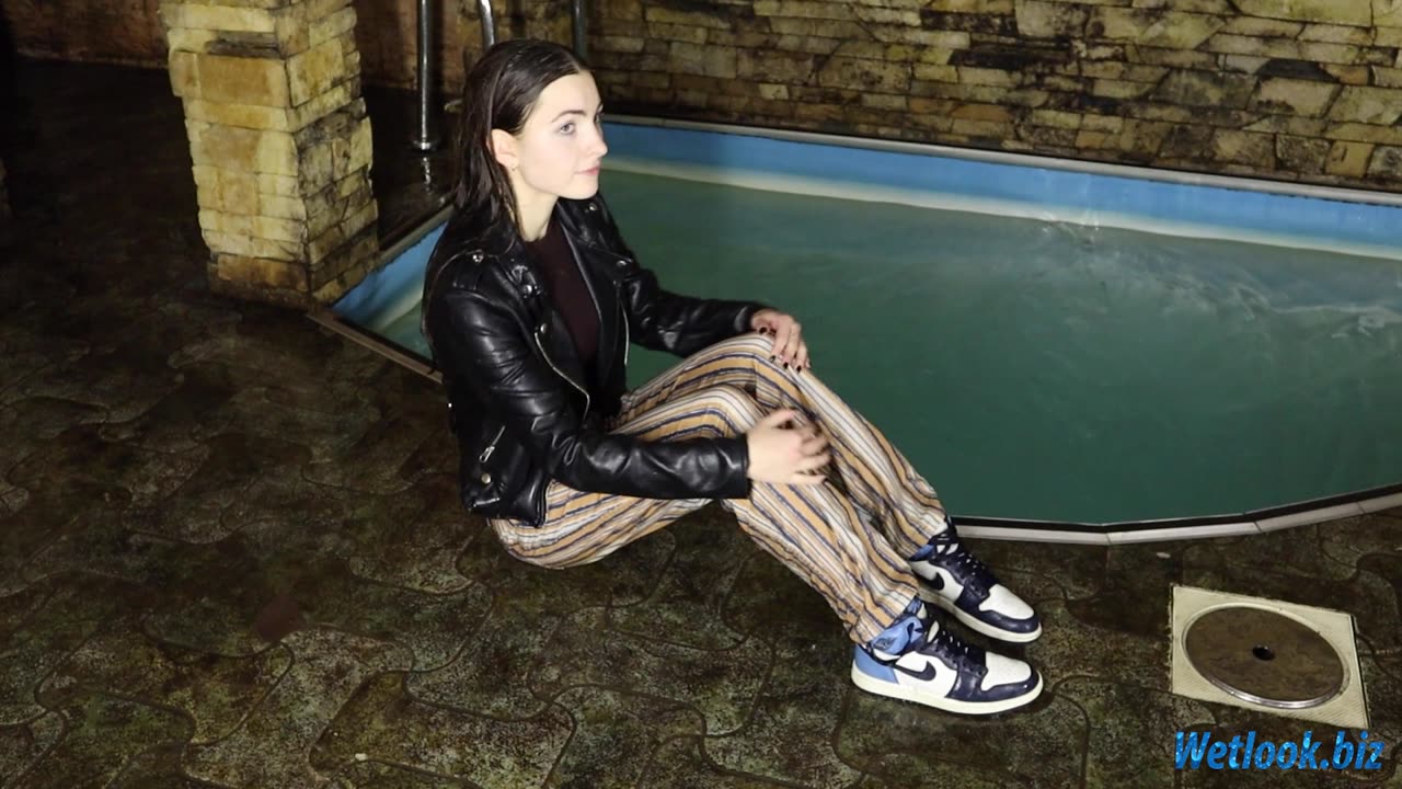 Wetlook girl in leather jacket