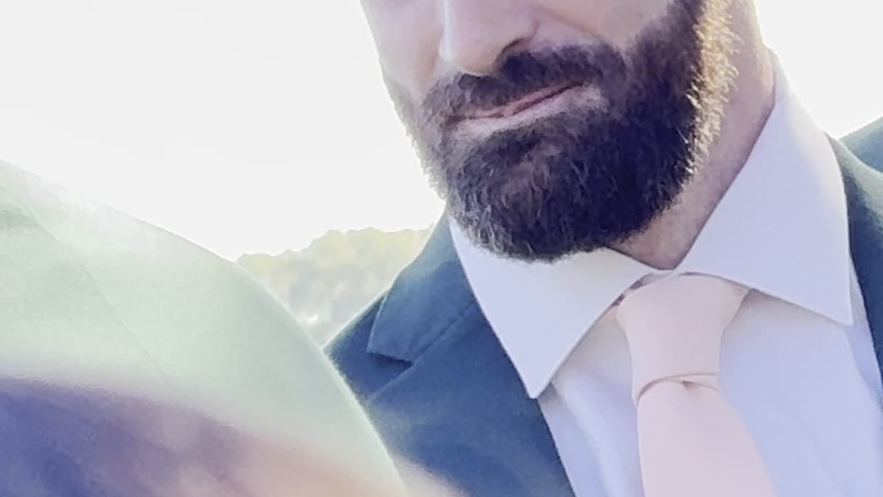 Best Man Fights To Not Laugh While Priest Sings in Prayer