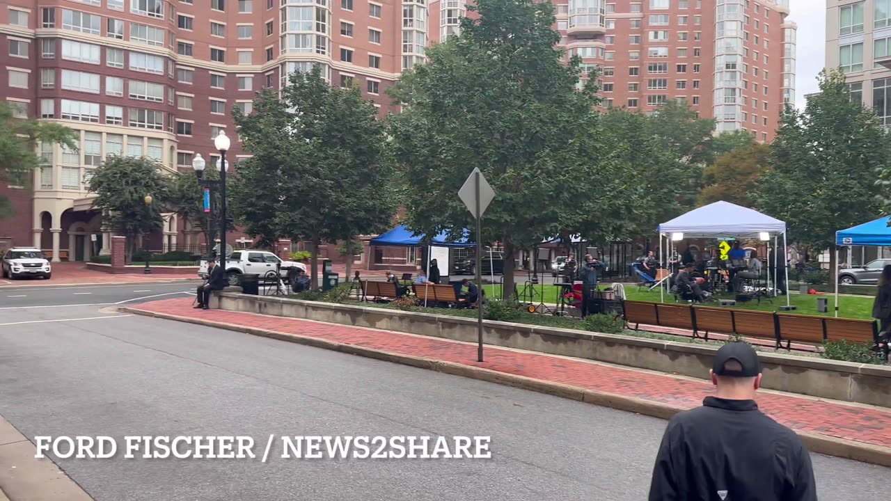 A handful of pro-Comey protesters stand outside US Courthouse in Alexandria