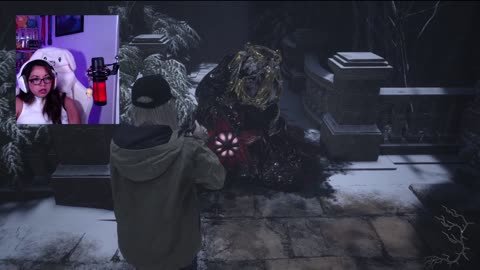 chica jugando residen evil dlc