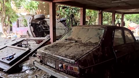 In Mexico floods, locals count the cost, seek the missing