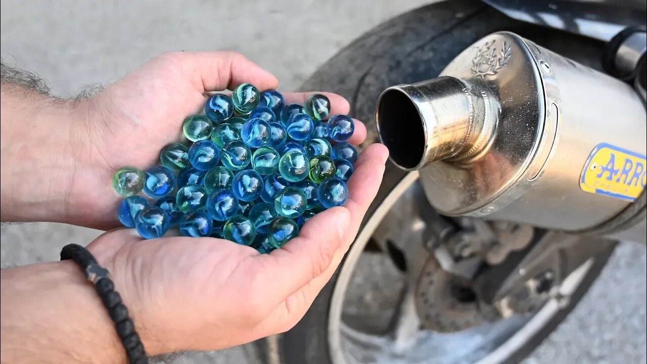 100 Marbles vs Motorcycle Exhaust: The Ultimate Experiment!"