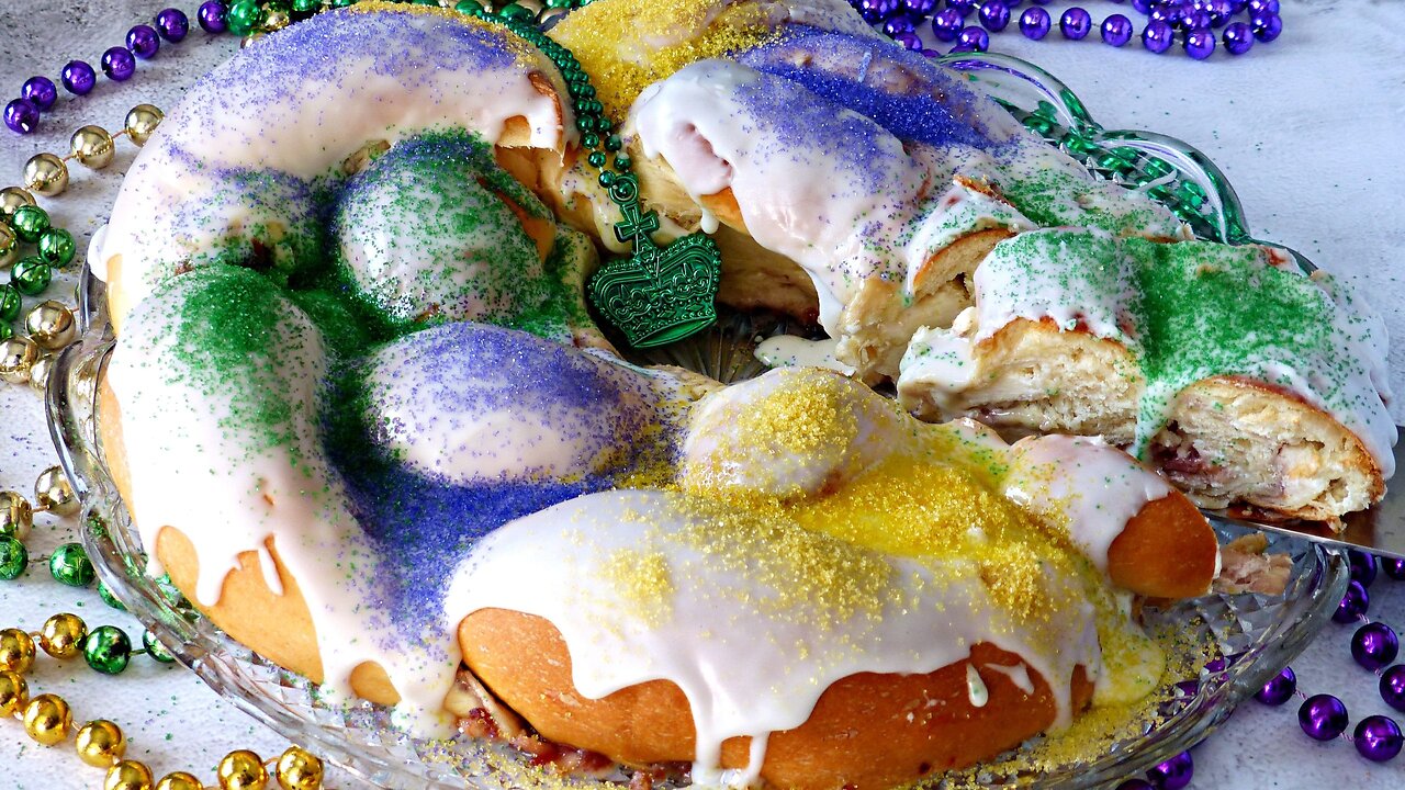 King Cake with Cream Cheese and Strawberry Jam Filling. The Famous New Orleans Dessert.