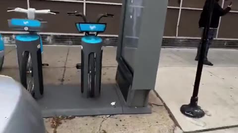 DHS raid a Walgreens in Chicago and outside they are detaining someone when the woman