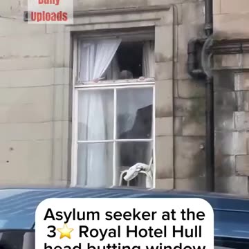 At the asylum hotel, the 4* Royal Hotel in Hull a man is seen with a knife looking
