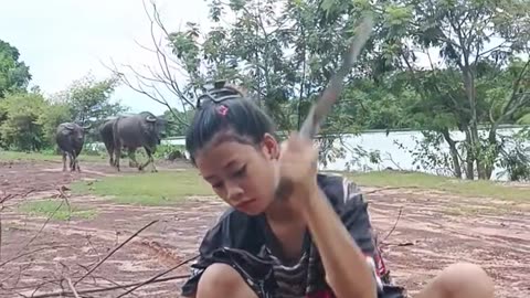 Asian teen girl works at fields