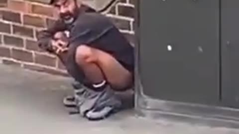 Indian immigrant caught streetshitting on the street in England