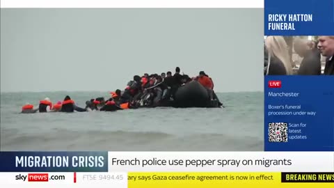 French police use pepper spray on migrants