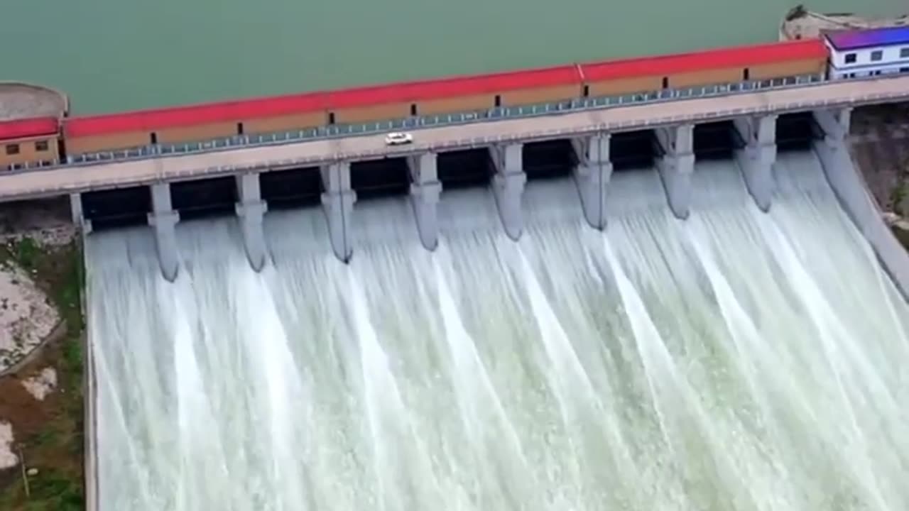Power of Nature: Water Spill from a Majestic Dam