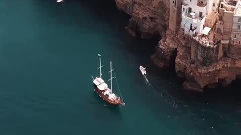Polignano a Mare is a charming town in Apulia, located on the rocky coast of the Adriatic Sea.