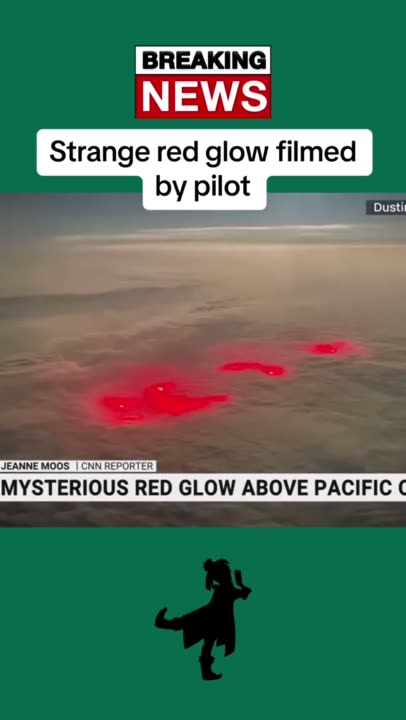 A strange red glow was filmed by a pilot as he traveled over the Pacific ocean