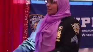 New York Police Department educating the public on how to properly wear a hijab