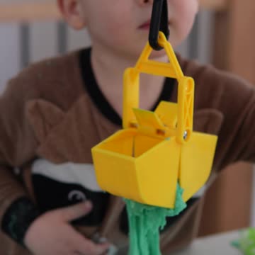 2 year old playing with his Tonka Wrecking Ball and Slimygloop Slimy Sand