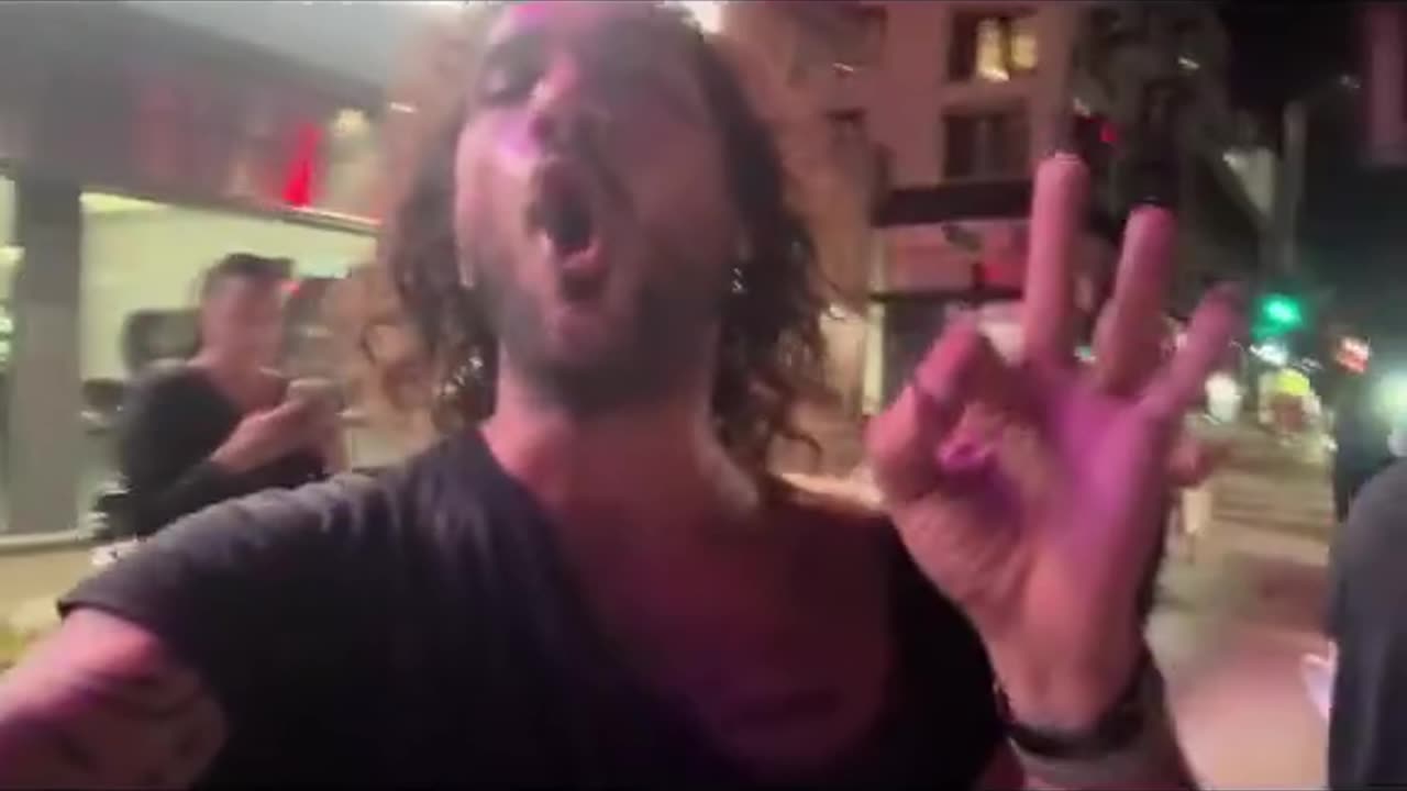 Patriot Gets Assaulted by Antifa at Tesla Campaign, Keeps Taunting Them Like a Boss