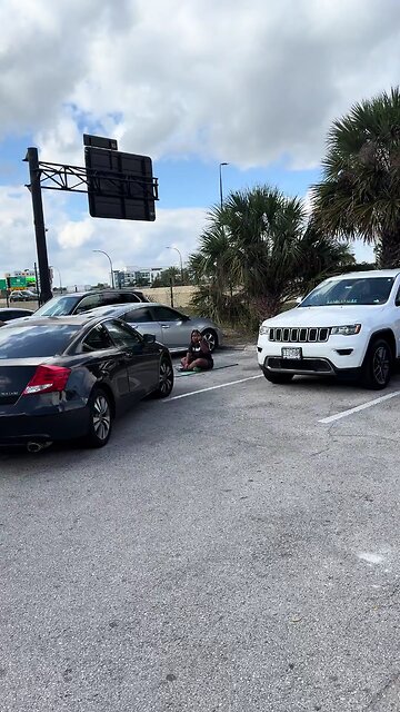 Viral Florida Parking Dispute: "We Were Here First!" Woman Sits in Spot to Save It