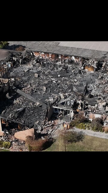 body cam and fire of church police shooting church shooter and church burning.