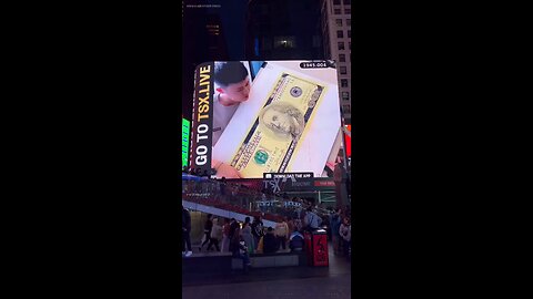 Hand-drawn US dollar appears on the billboards in Times Square, USA.